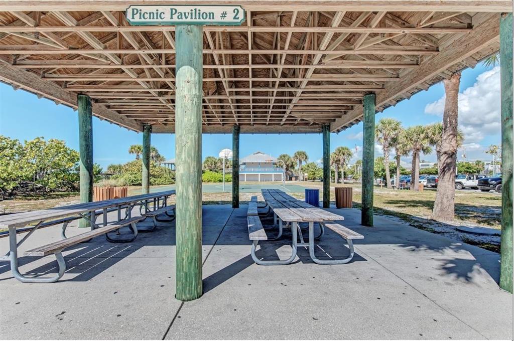 304 Arbor Street Port Charlotte, FL 33953 - Photo 14 of 26 a view of a porch with furniture and floor to ceiling window