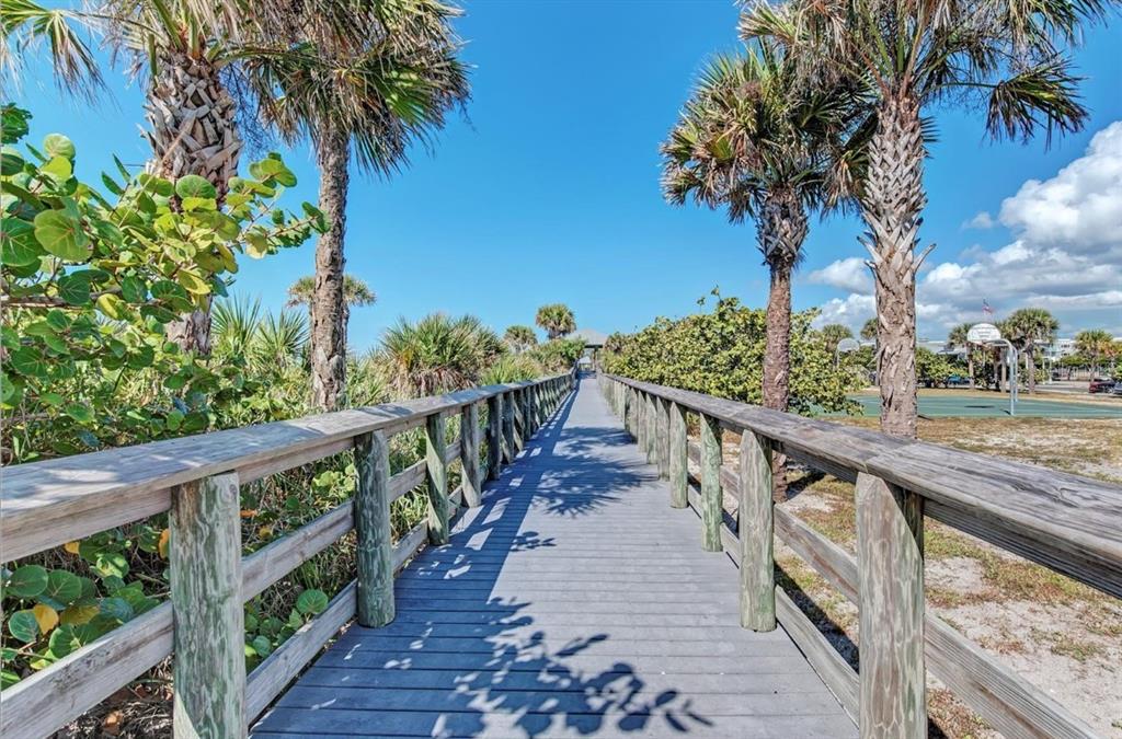304 Arbor Street Port Charlotte, FL 33953 - Photo 16 of 26 a view of a balcony with wooden stairs