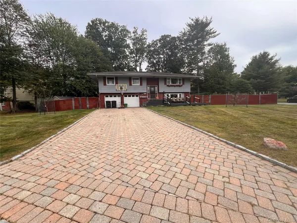 a swimming pool view with a pathway