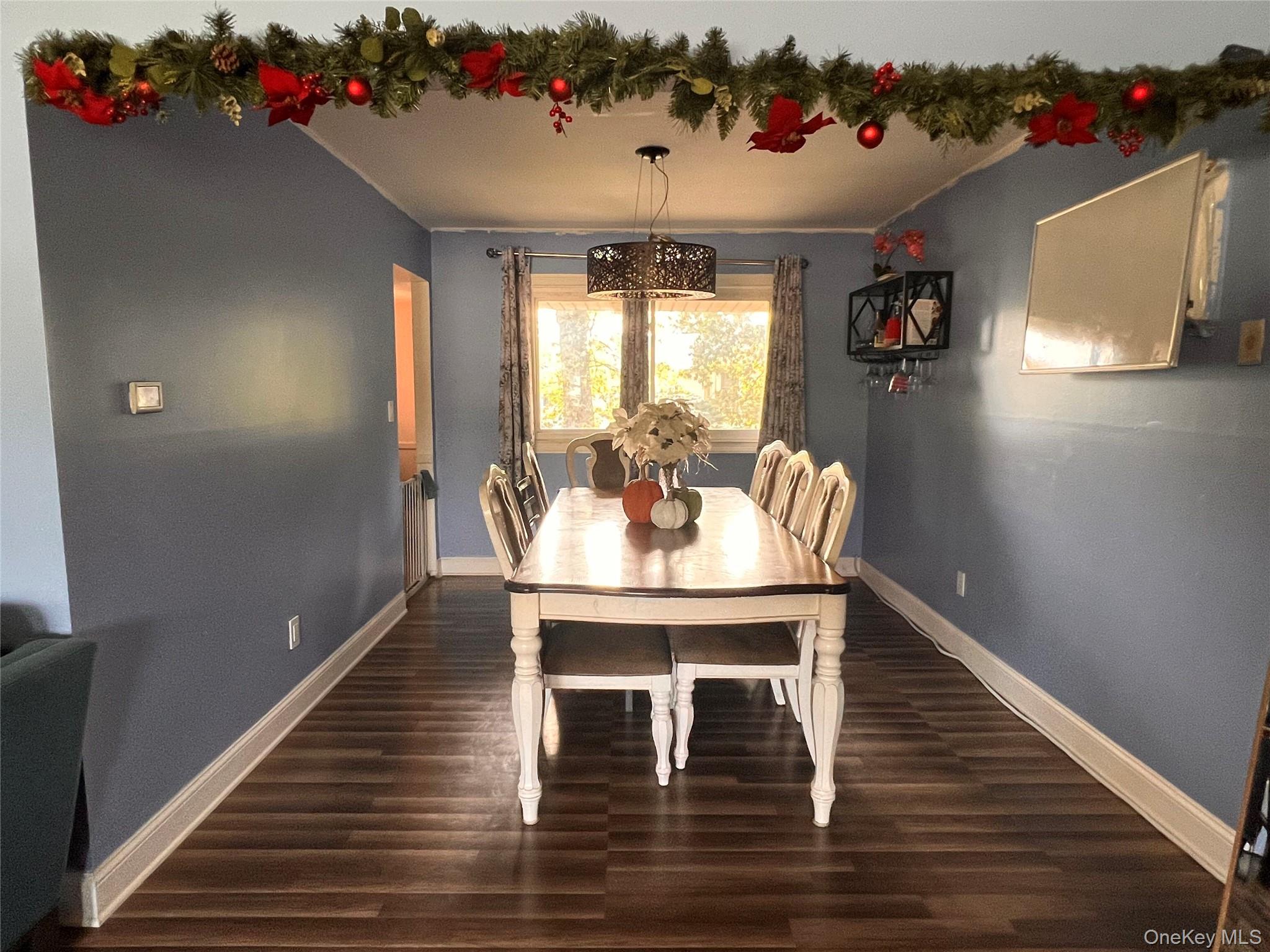 17 Forestdale Road Spring Valley, NY 10977 - Photo 2 of 10 a view of a dining room with furniture and chandelier