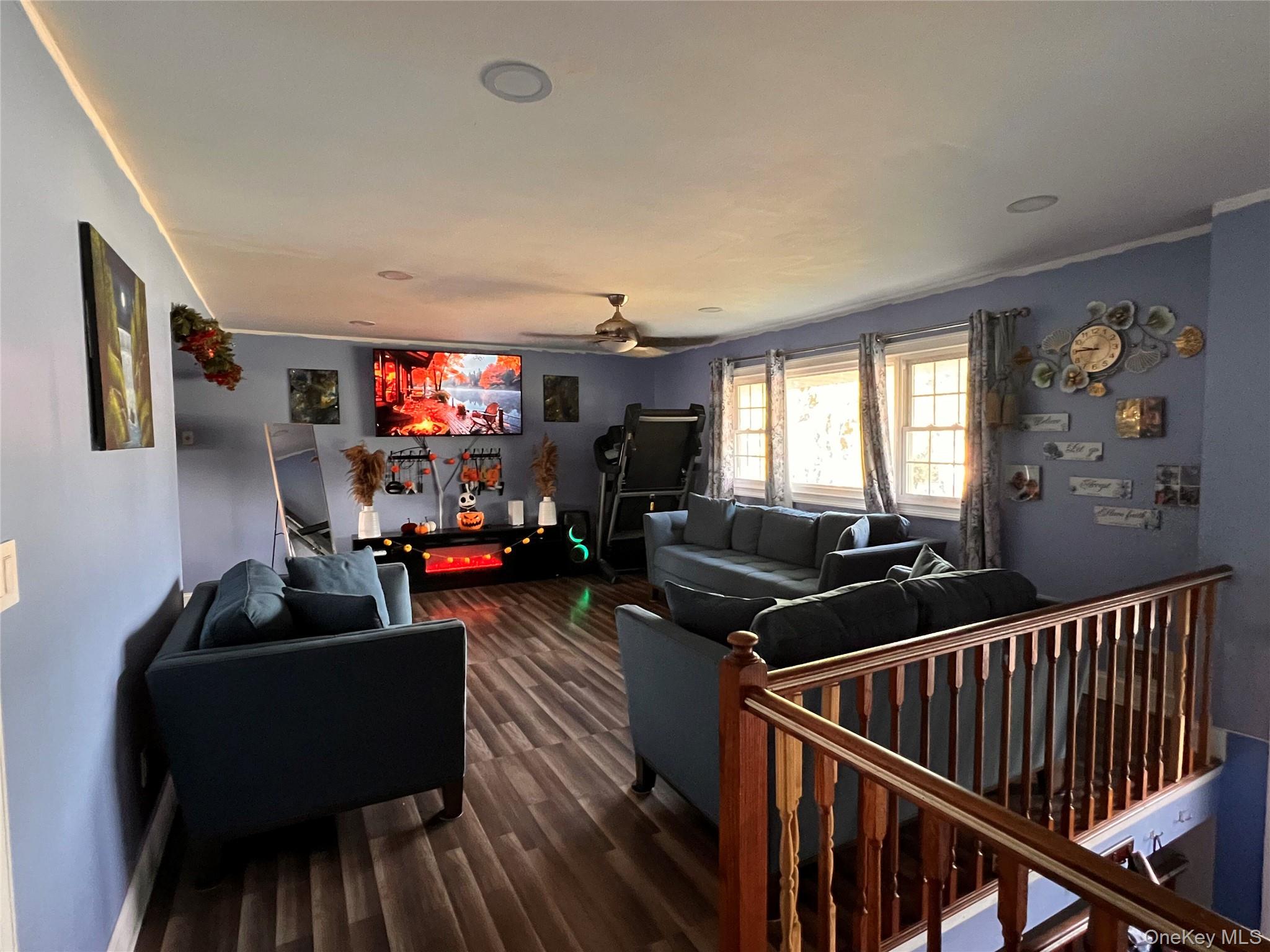 17 Forestdale Road Spring Valley, NY 10977 - Photo 3 of 10 a living room with furniture and a flat screen tv