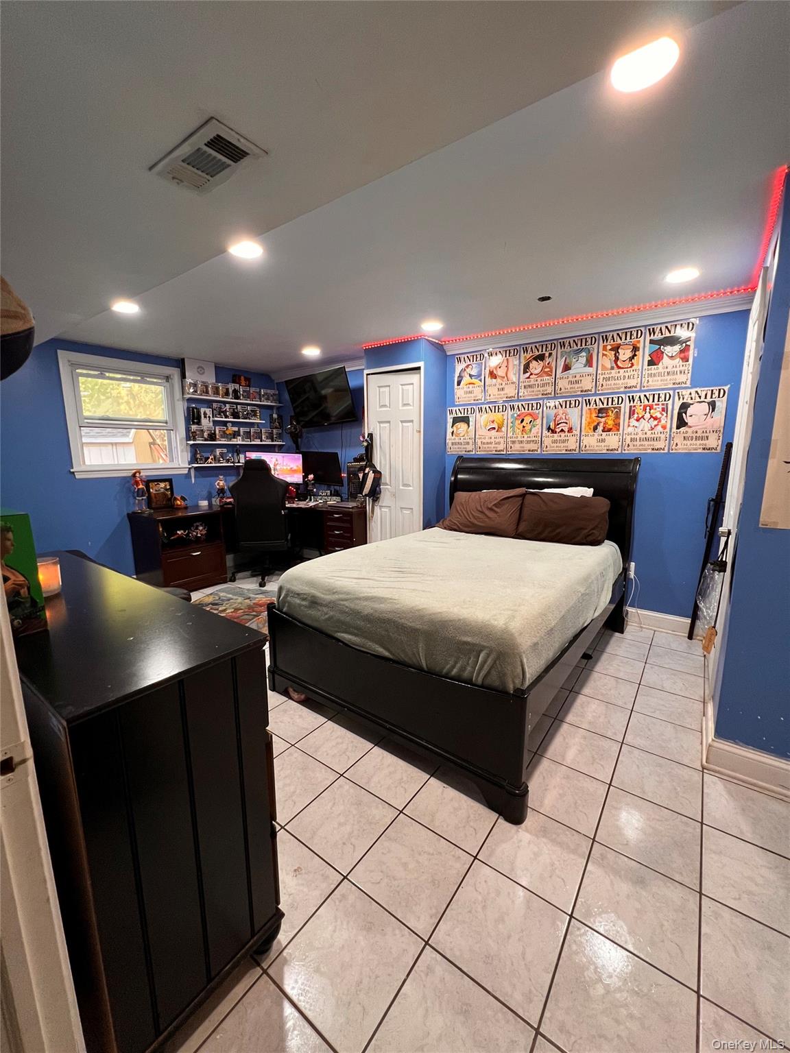 17 Forestdale Road Spring Valley, NY 10977 - Photo 6 of 10 a bedroom with double bed and a large window