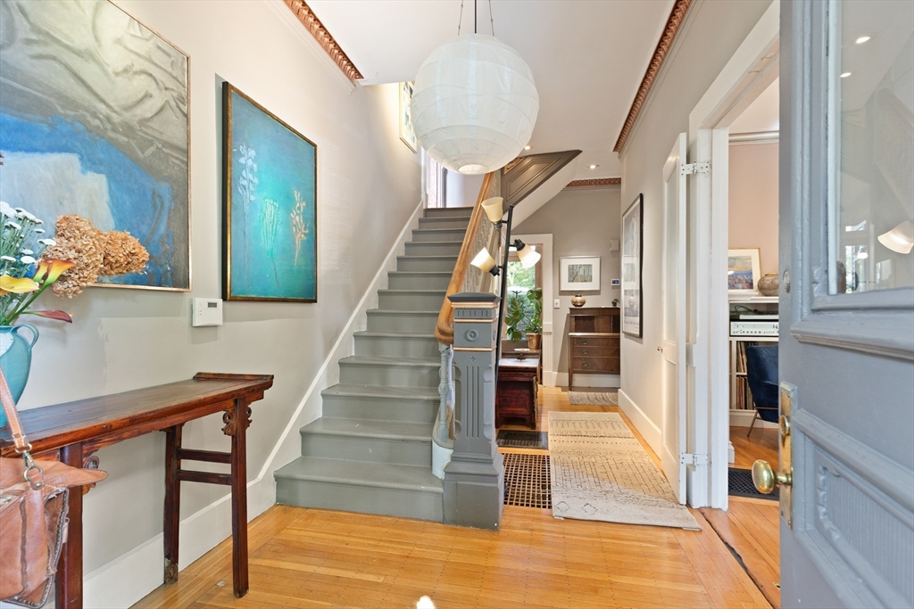 32 Hawthorn Street Cambridge, MA 02138 - Photo 13 of 42 a view of entryway and hall with wooden floor