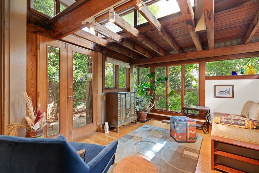 32 Hawthorn Street Cambridge, MA 02138 - Photo 14 of 42 a living room with furniture and a large window