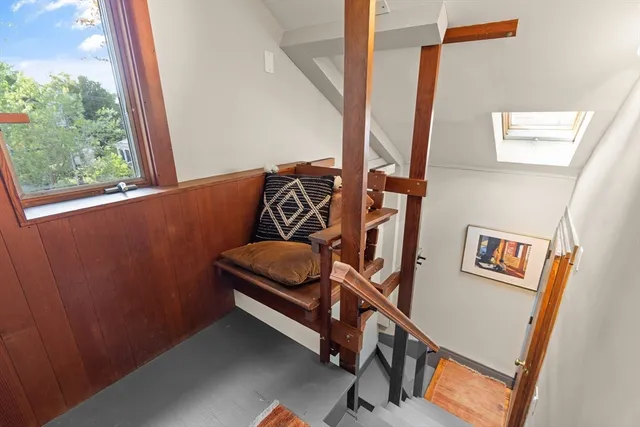 a view of livingroom with furniture and a window