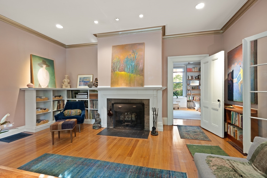 32 Hawthorn Street Cambridge, MA 02138 - Photo 6 of 42 a living room with furniture and a fireplace