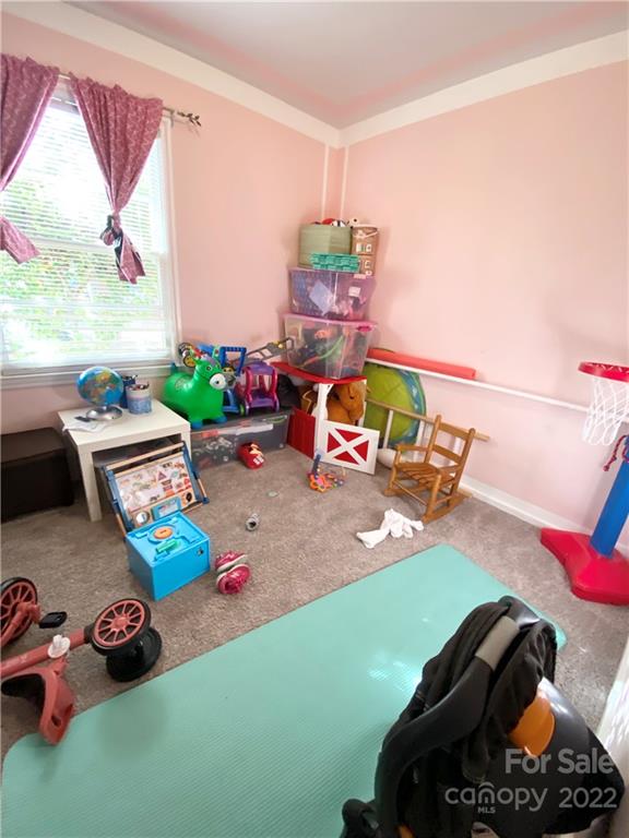 3239 Edsel Place Charlotte, NC 28205 - Photo 7 of 9 a room with toys and a wooden floor