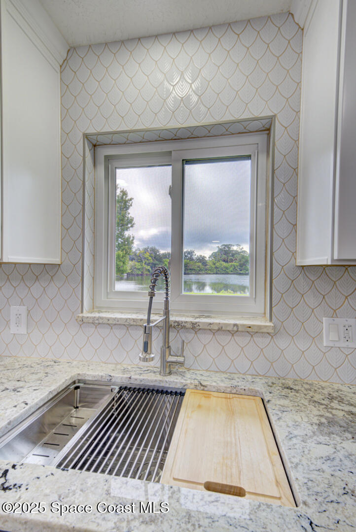3733 Crossbow Drive Cocoa, FL 32926 - Photo 14 of 25 a view of a living room and a window