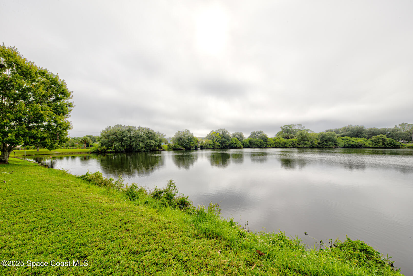 3733 Crossbow Drive Cocoa, FL 32926 - Photo 22 of 25 a body of water with a lake view
