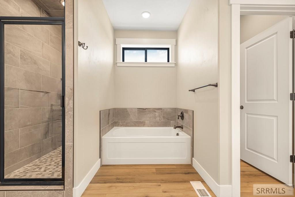 4961 Nordic Way Rexburg, ID 83440 - Photo 28 of 71 Master Bath with Separate Shower and Bathtub