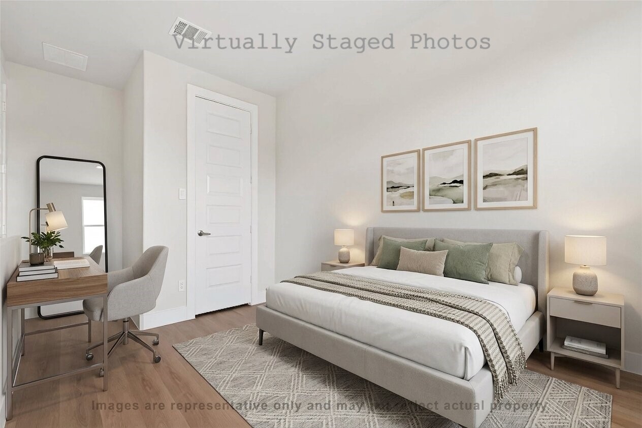 10719 Mason Road, Unit 26 Richmond, TX 77406 - Photo 13 of 50 Virtual Staging - Modern bedroom features a sleek gray bed with soft green accents, matching nightstands, and a small workspace with a leaning floor mirror