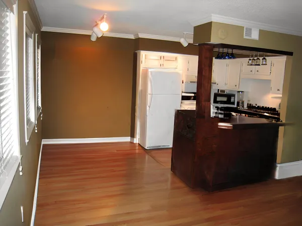 a living room with wooden floor