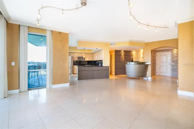 a view of a room with a large window