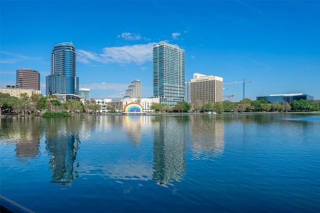 a view of swimming pool with outdoor seating and yard