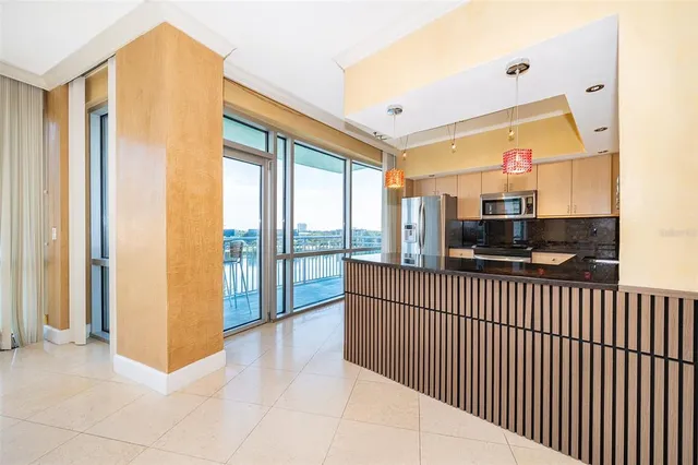 a view of a living room hardwood floor and furniture