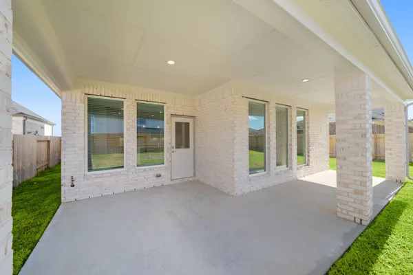 a view of a big room with large windows