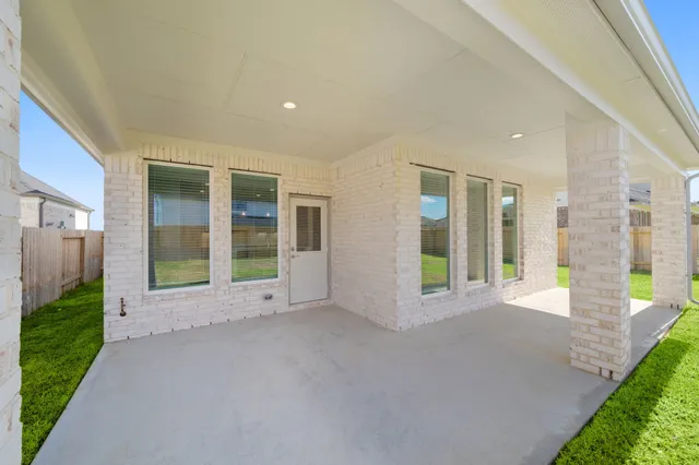 a view of a big room with large windows