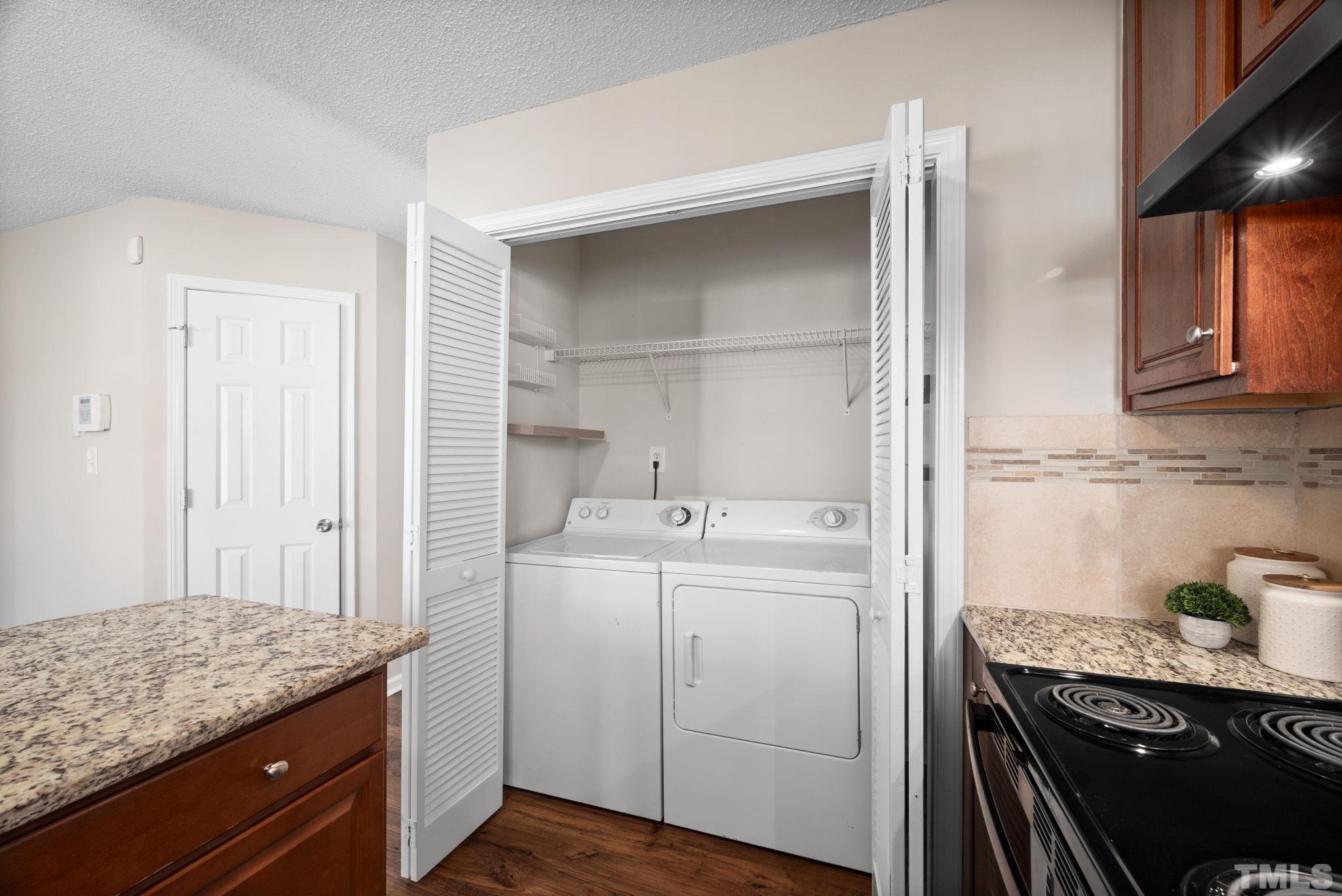 124 Gentle Rio Court Garner, NC 27529 - Photo 14 of 37 a kitchen with a sink and cabinets