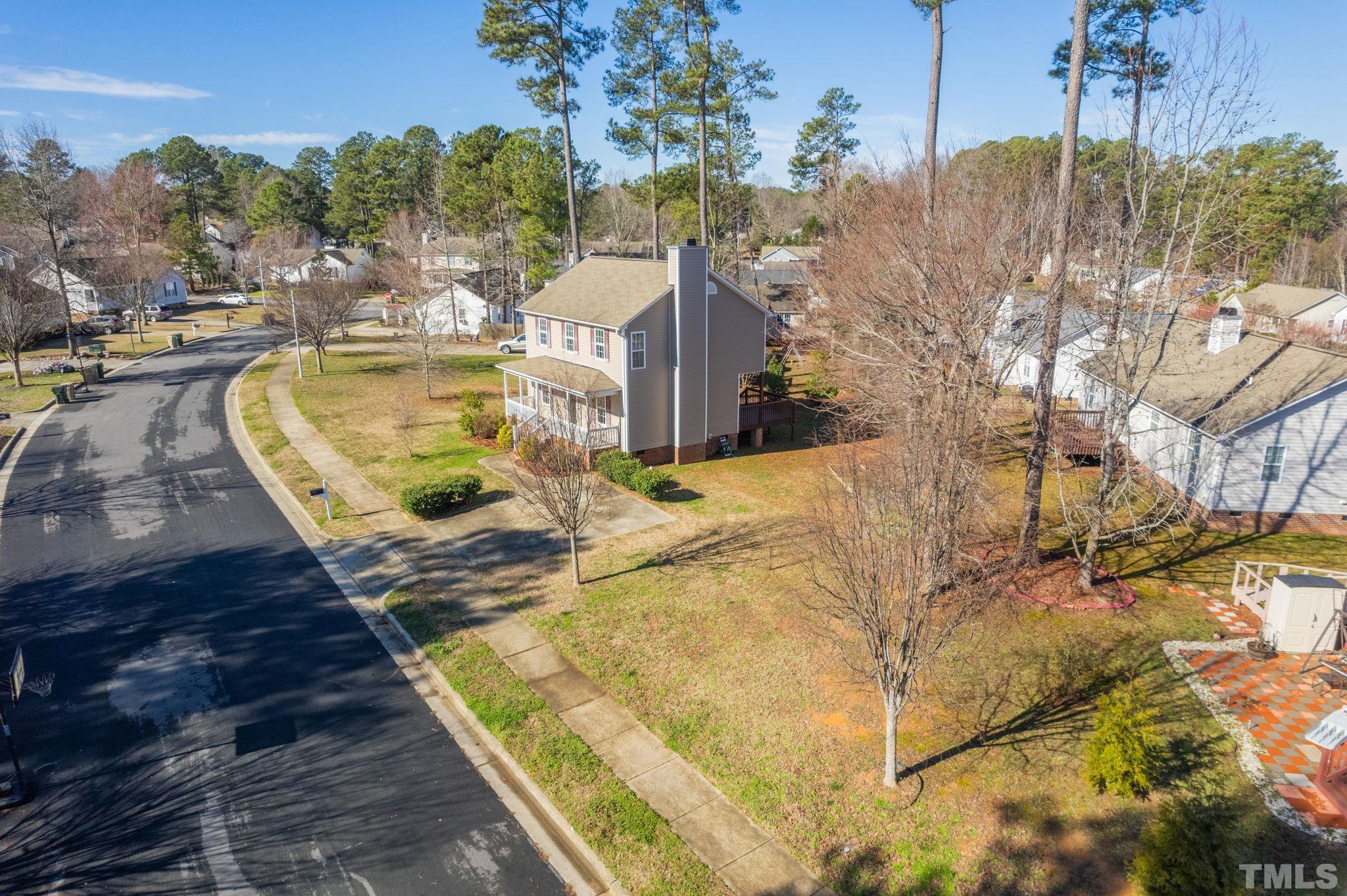 124 Gentle Rio Court Garner, NC 27529 - Photo 2 of 37 a view of a swimming pool with a patio