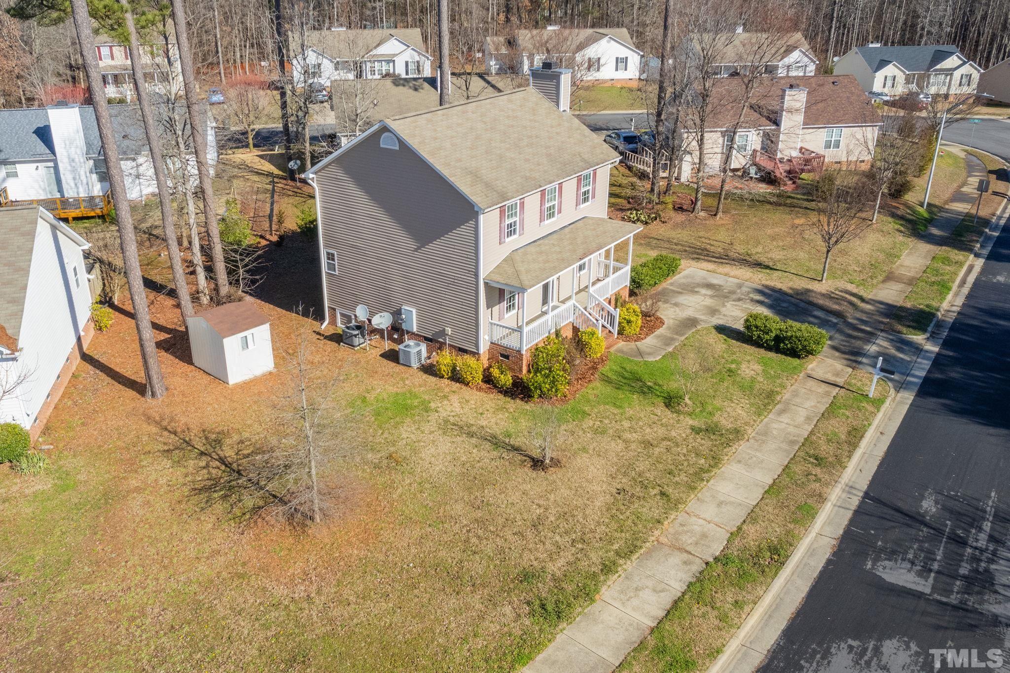 124 Gentle Rio Court Garner, NC 27529 - Photo 3 of 37 a aerial view of a house with a yard