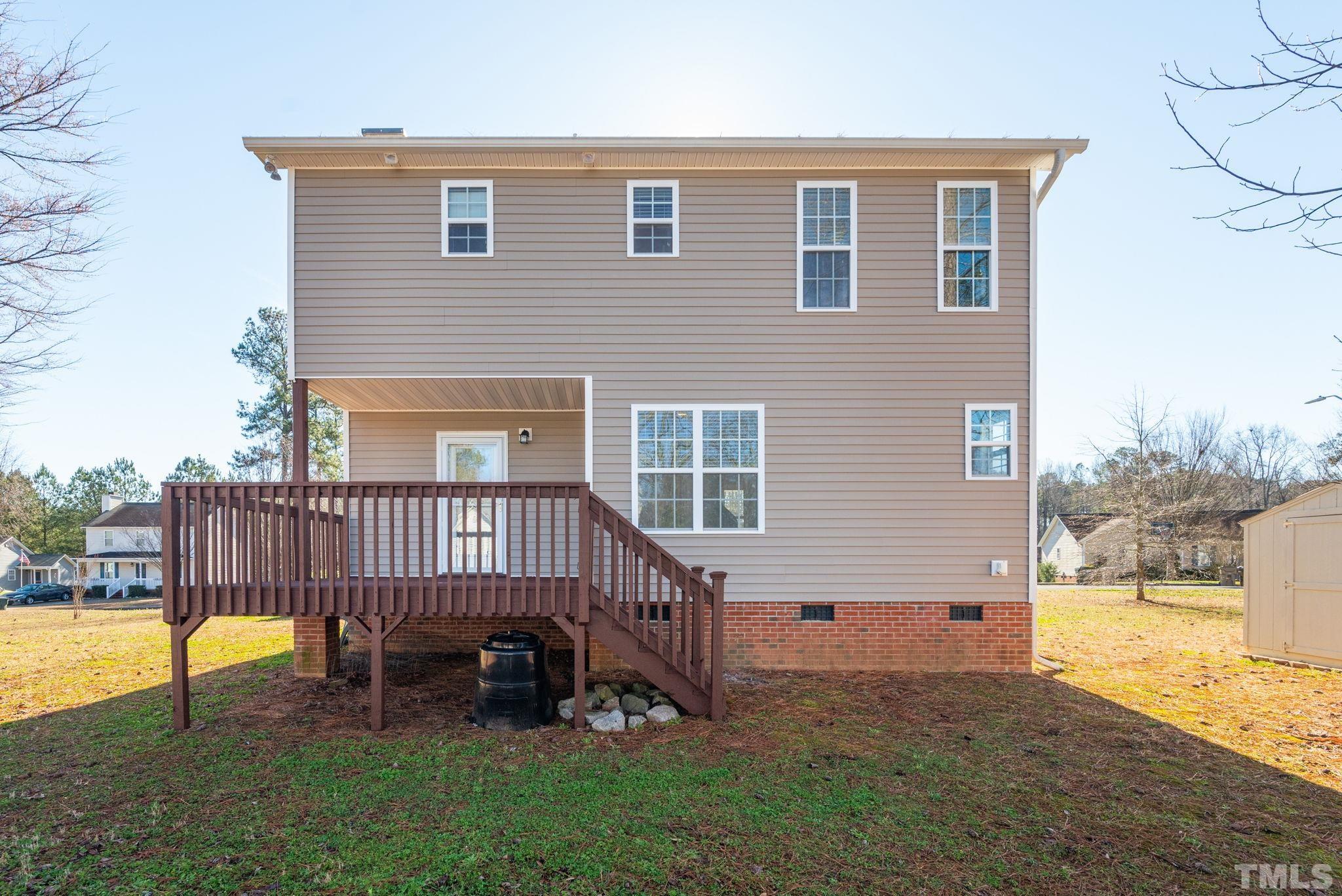 124 Gentle Rio Court Garner, NC 27529 - Photo 33 of 37 a view of backyard with deck