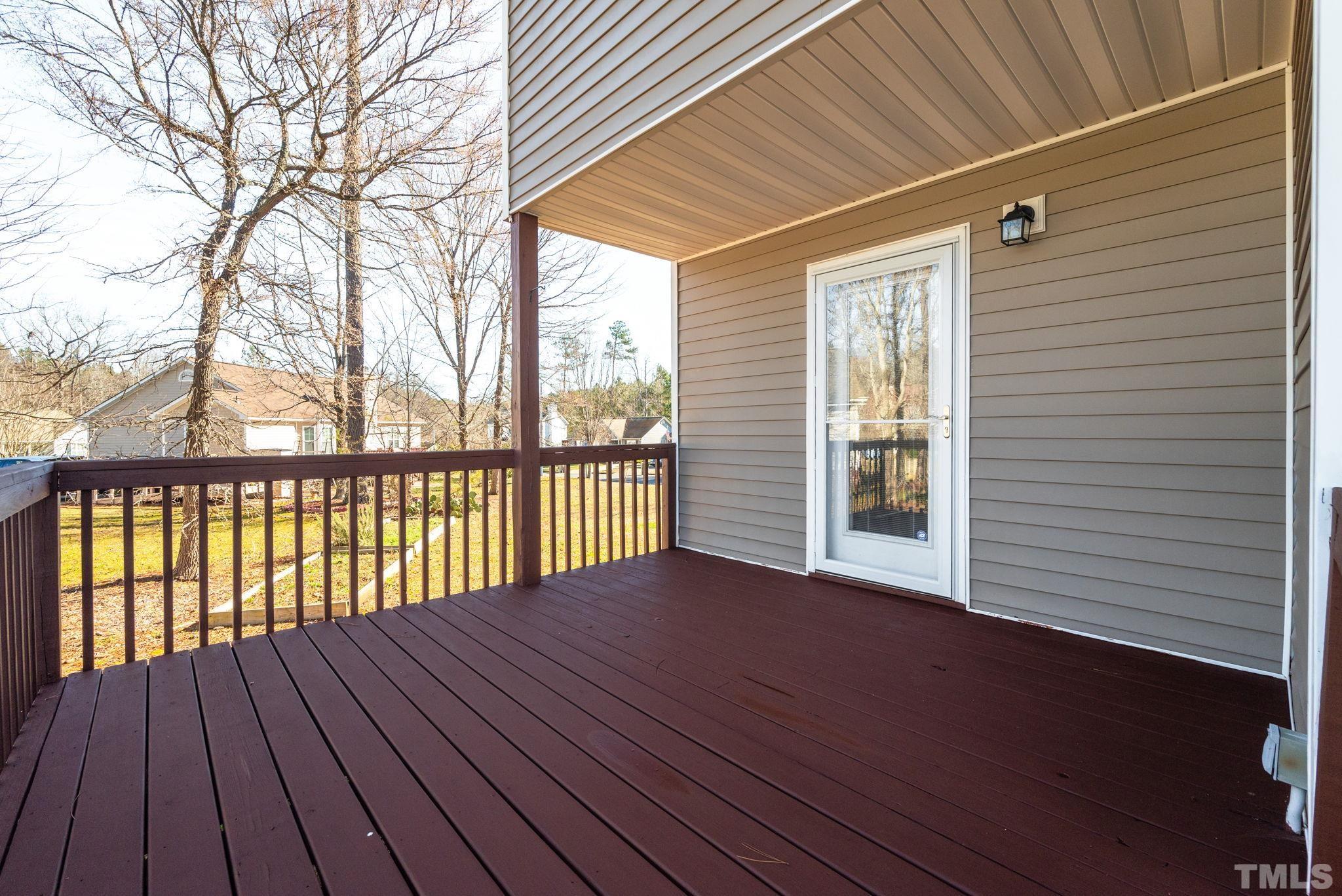 124 Gentle Rio Court Garner, NC 27529 - Photo 34 of 37 a view of backyard with a deck