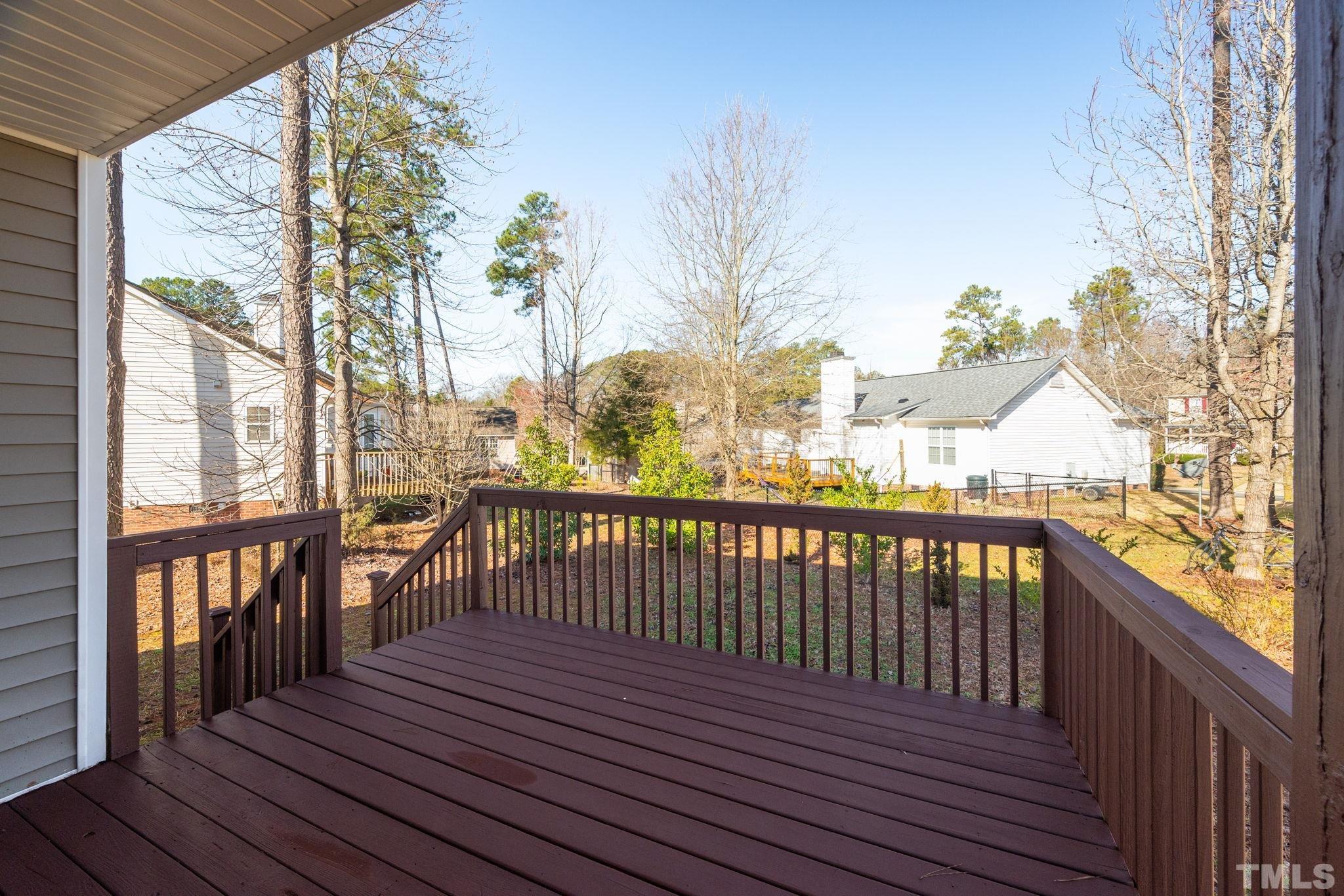 124 Gentle Rio Court Garner, NC 27529 - Photo 35 of 37 a view of a balcony with wooden floor