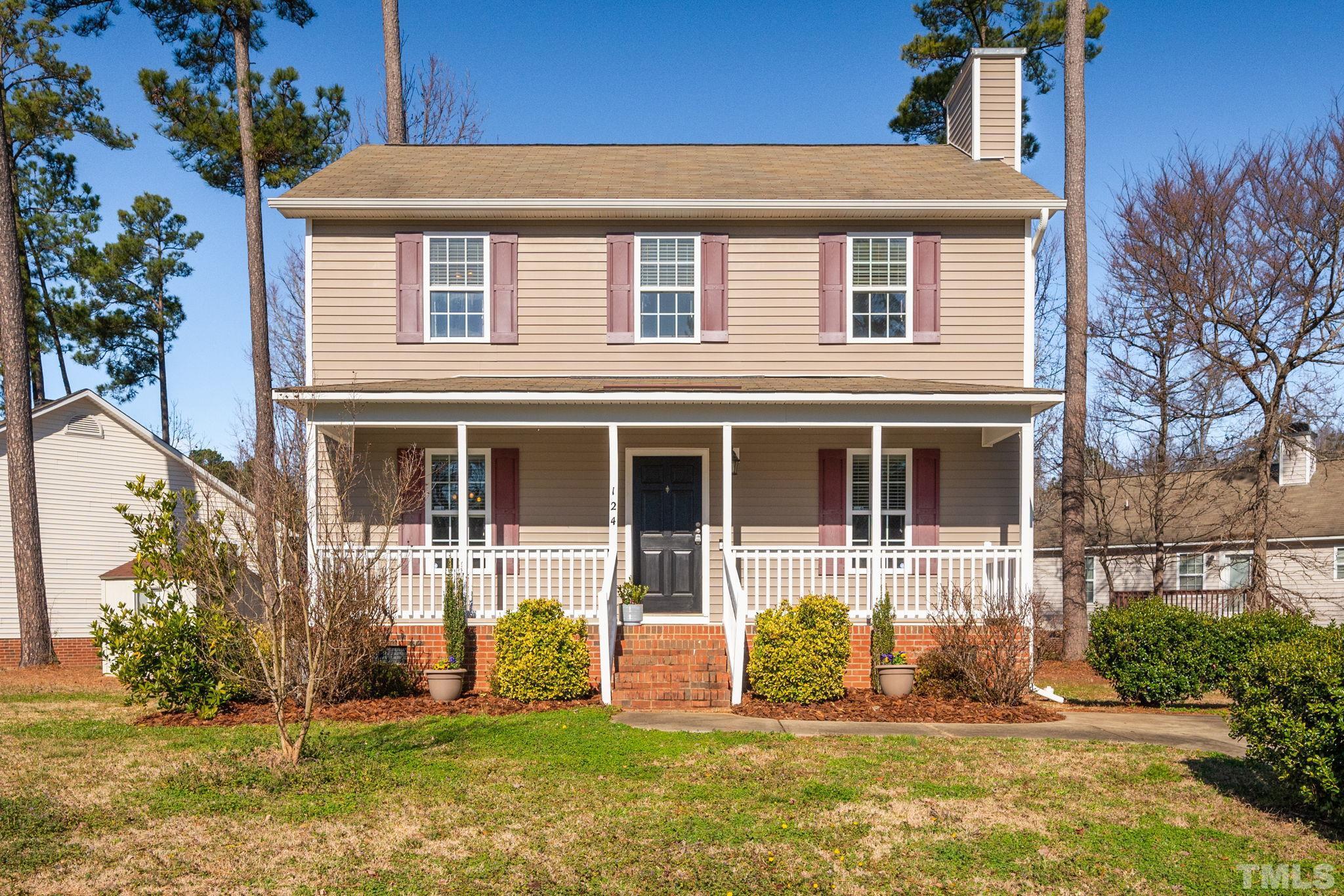 124 Gentle Rio Court Garner, NC 27529 - Photo 7 of 37 a front view of a house