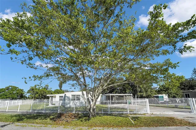 a view of backyard with green space