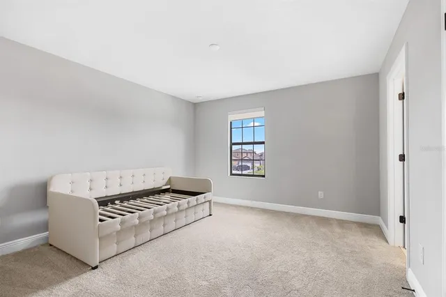 a view of workspace with furniture and windows