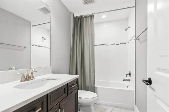 a view of a room next to a yard