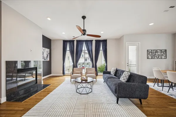 a living room with furniture and a table