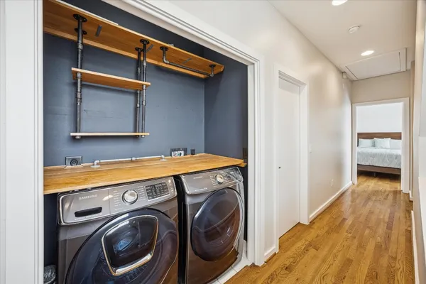 a utility room with dryer and washer