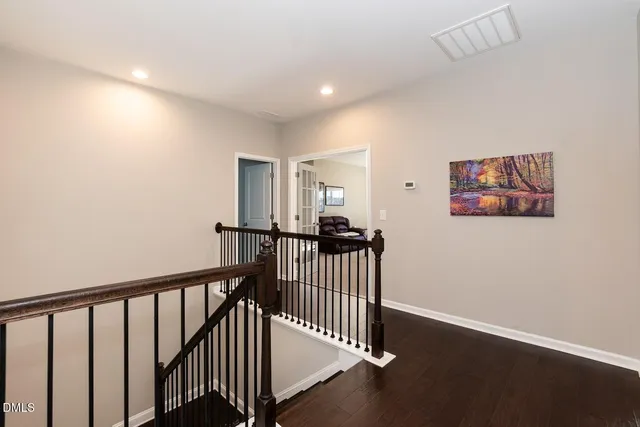 a bathroom with a sink toilet vanity and shower