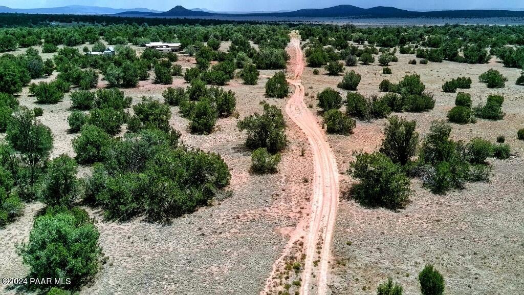 333 Stewart Road Seligman, AZ 86337 - Photo 2 of 6 a view of a lot of a yard and mountain