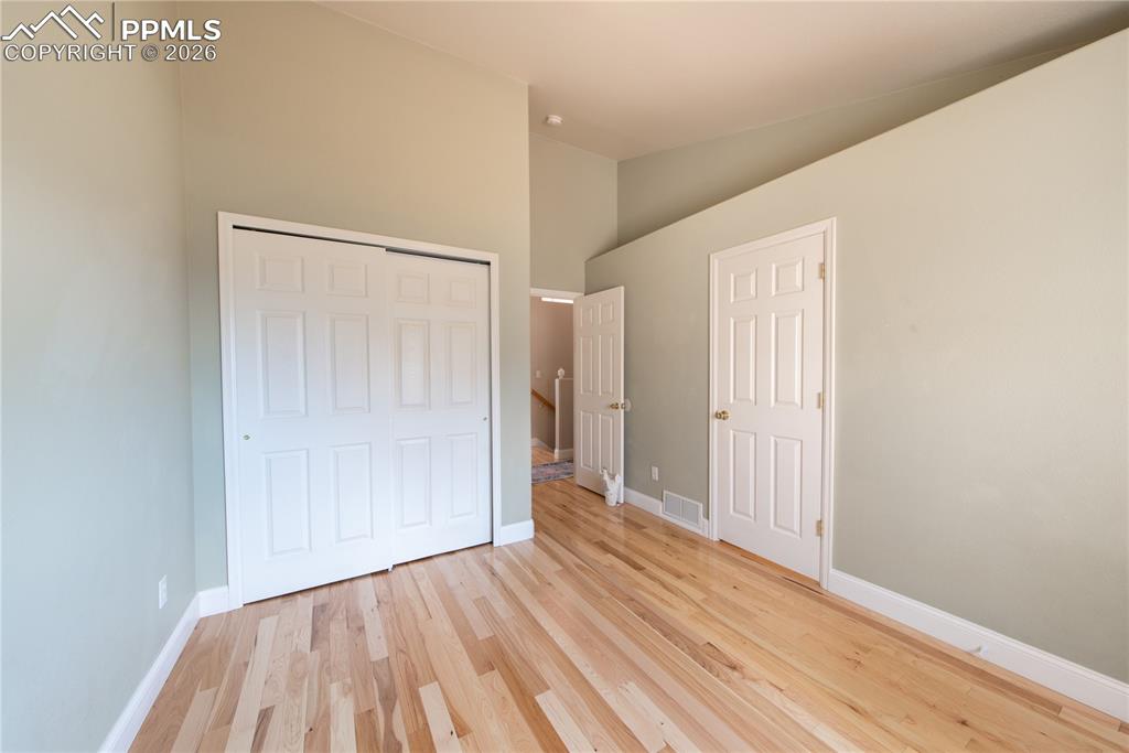 9385 Winged Foot Road Peyton, CO 80831 - Photo 20 of 50 a view of a room with wooden floor