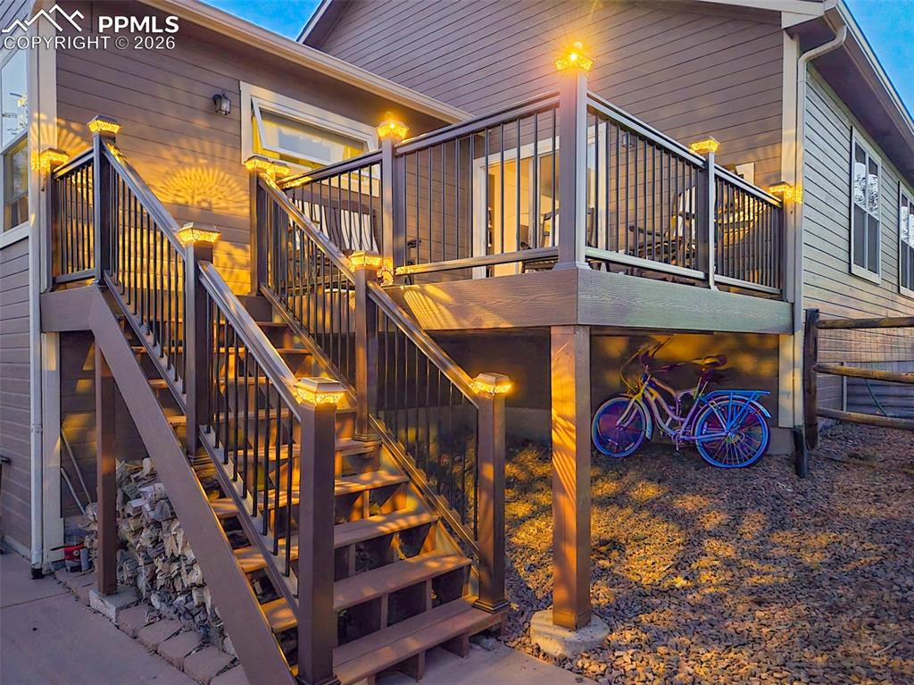 9385 Winged Foot Road Peyton, CO 80831 - Photo 40 of 50 an outdoor space with wooden stairs