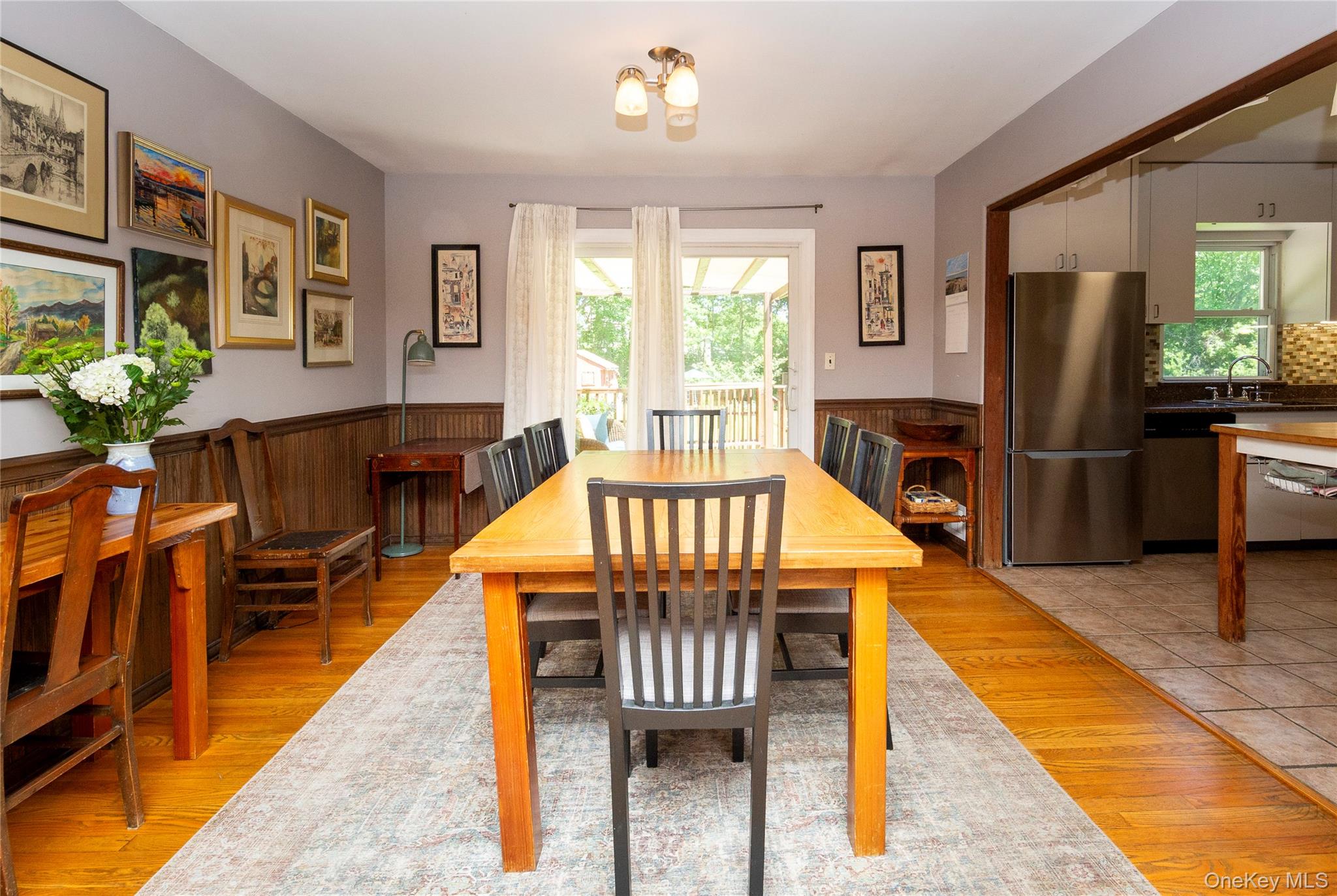 32 Cobb Road Brewster, NY 10509 - Photo 15 of 49 a dining room with furniture a chandelier and wooden floor