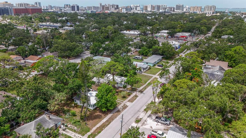 2050 10th Street Sarasota, FL 34237 - Photo 8 of 16 an aerial view of residential houses with outdoor space and trees