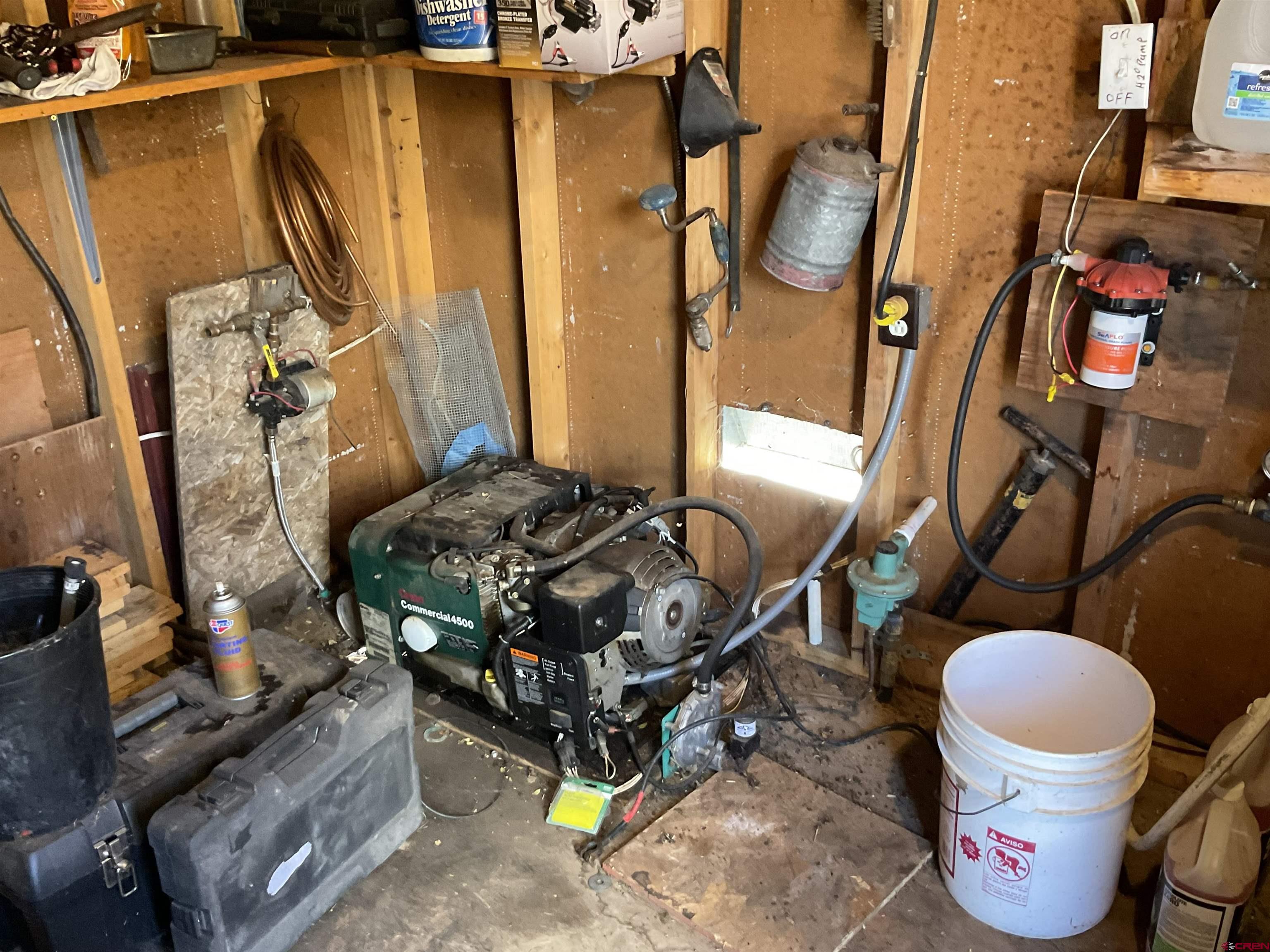 20261 3100th Road Hotchkiss, CO 81419 - Photo 21 of 41 a living room with furniture and a fireplace