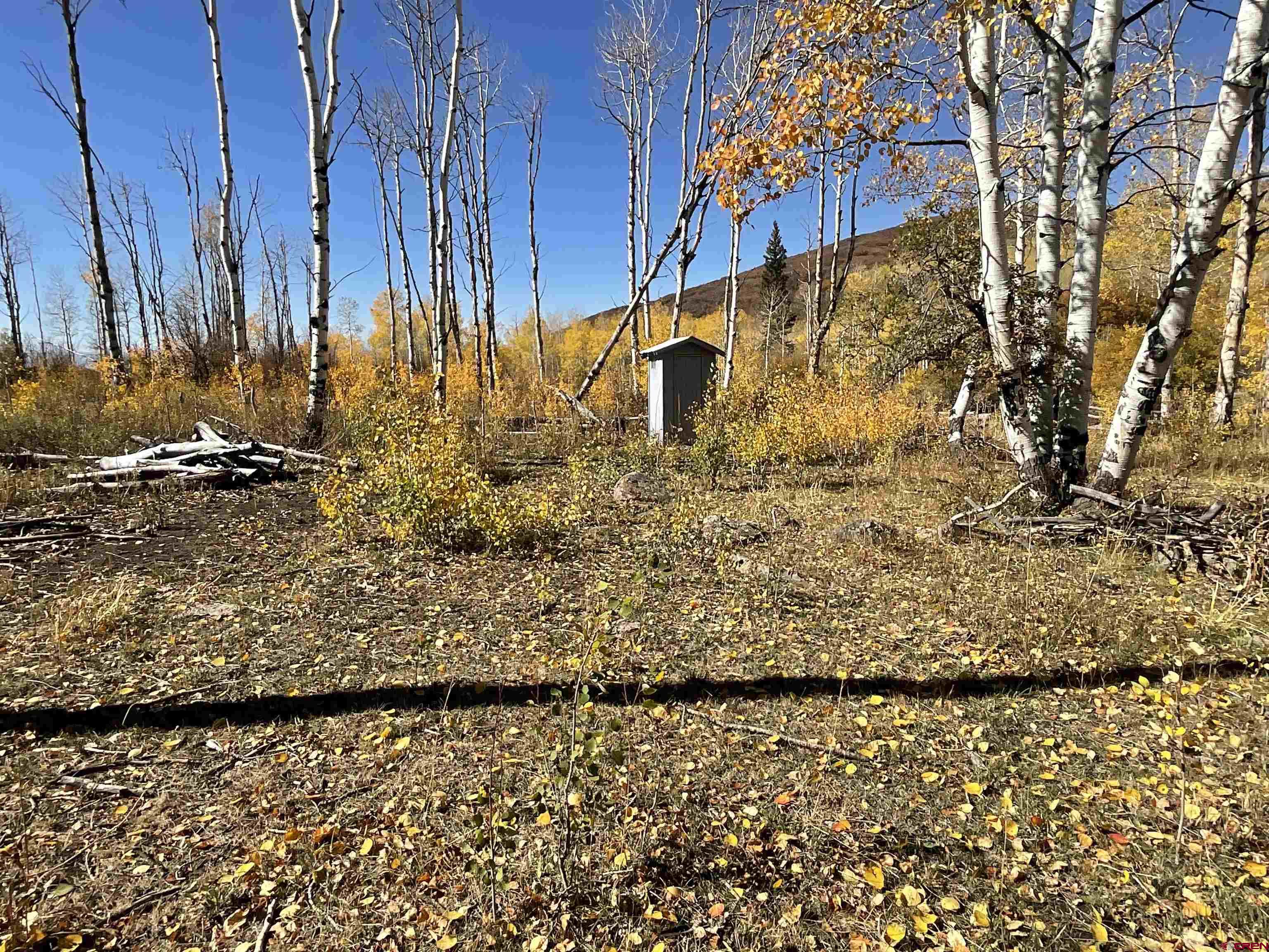 20261 3100th Road Hotchkiss, CO 81419 - Photo 26 of 41 a view of a yard with wooden fence