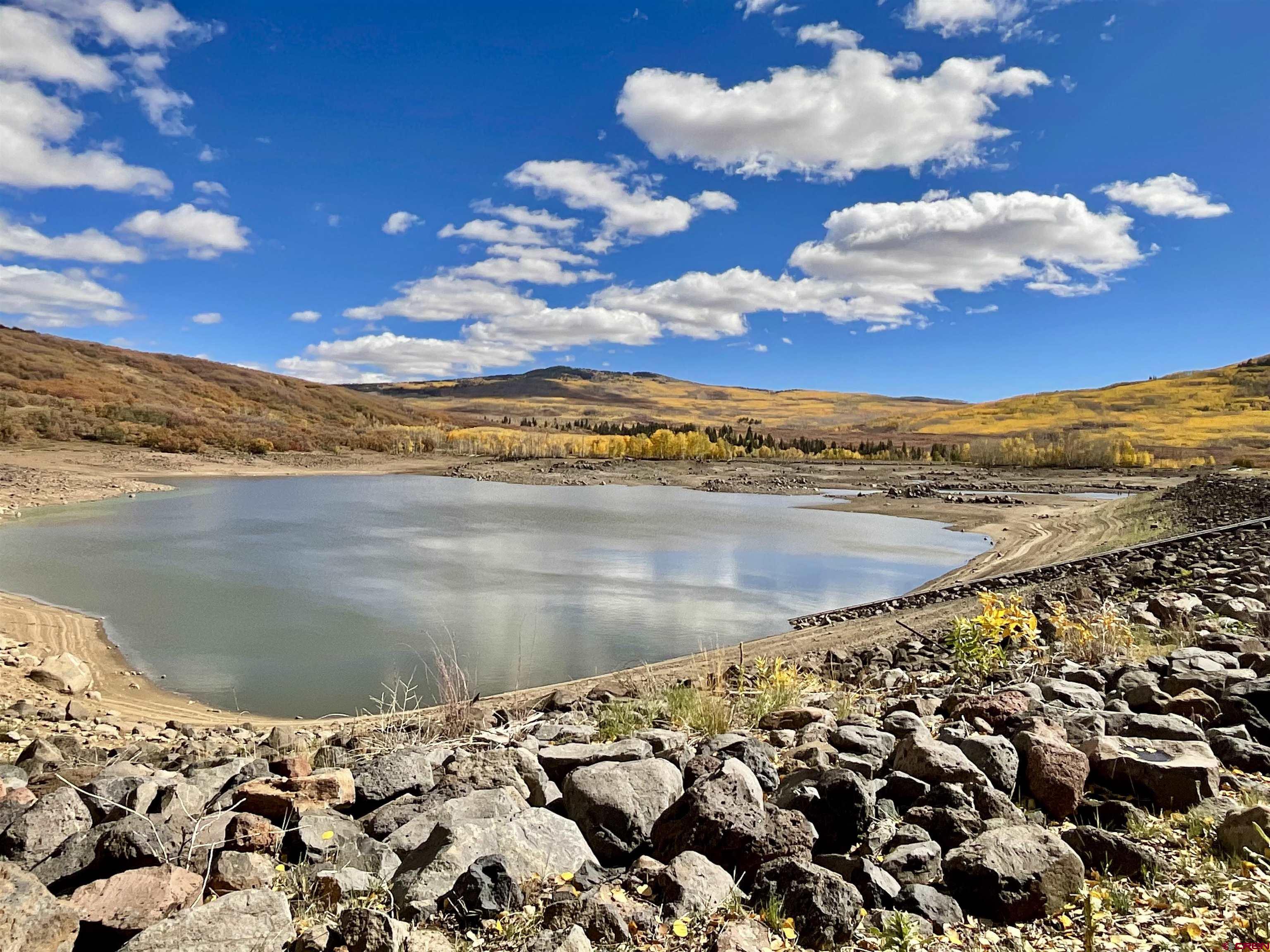 20261 3100th Road Hotchkiss, CO 81419 - Photo 32 of 41 a view of a lake from a balcony