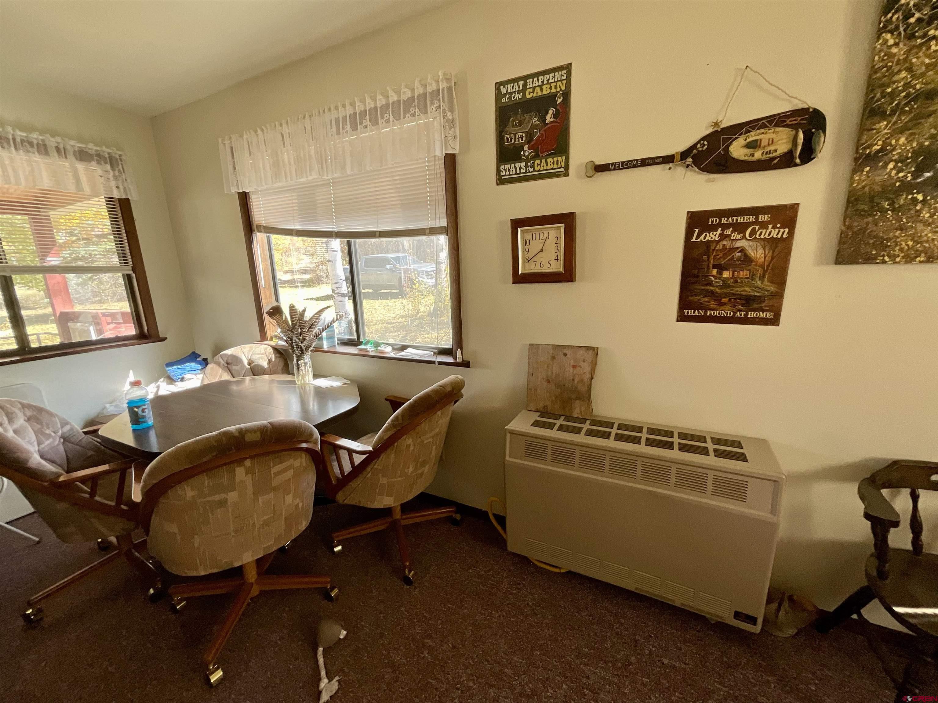 20261 3100th Road Hotchkiss, CO 81419 - Photo 5 of 41 a room with gym equipment and a window