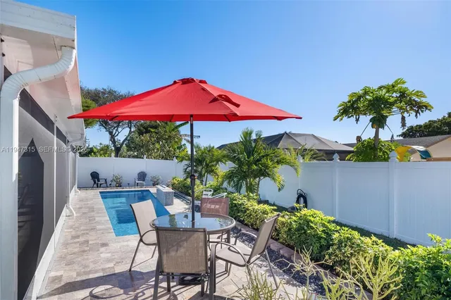 a living room with furniture fireplace and a flat screen tv