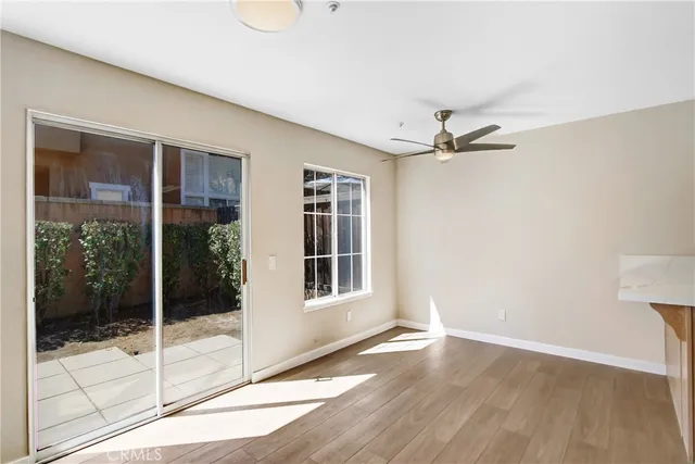 a view of a room with a large window