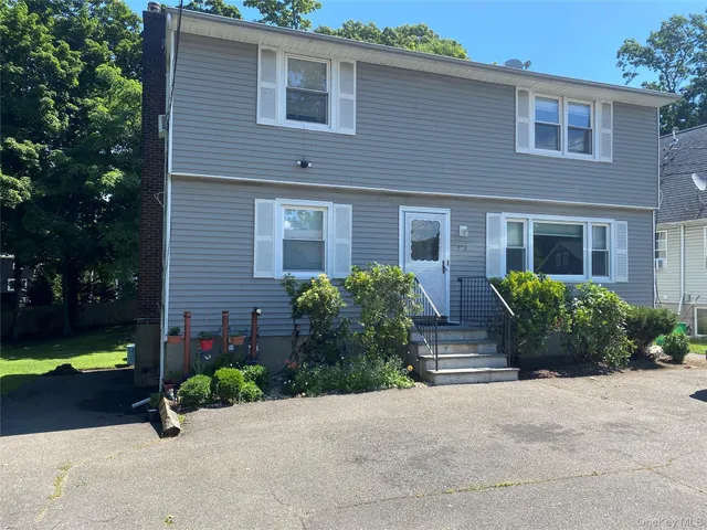 front view of house with a yard