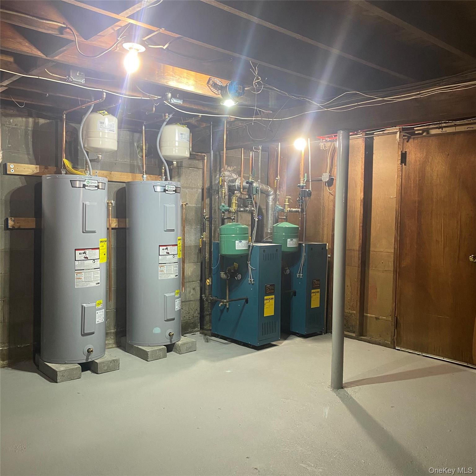 282 Laurel Road, Unit A East Northport, NY 11731 - Photo 16 of 20 a view of a hallway with wooden shelves