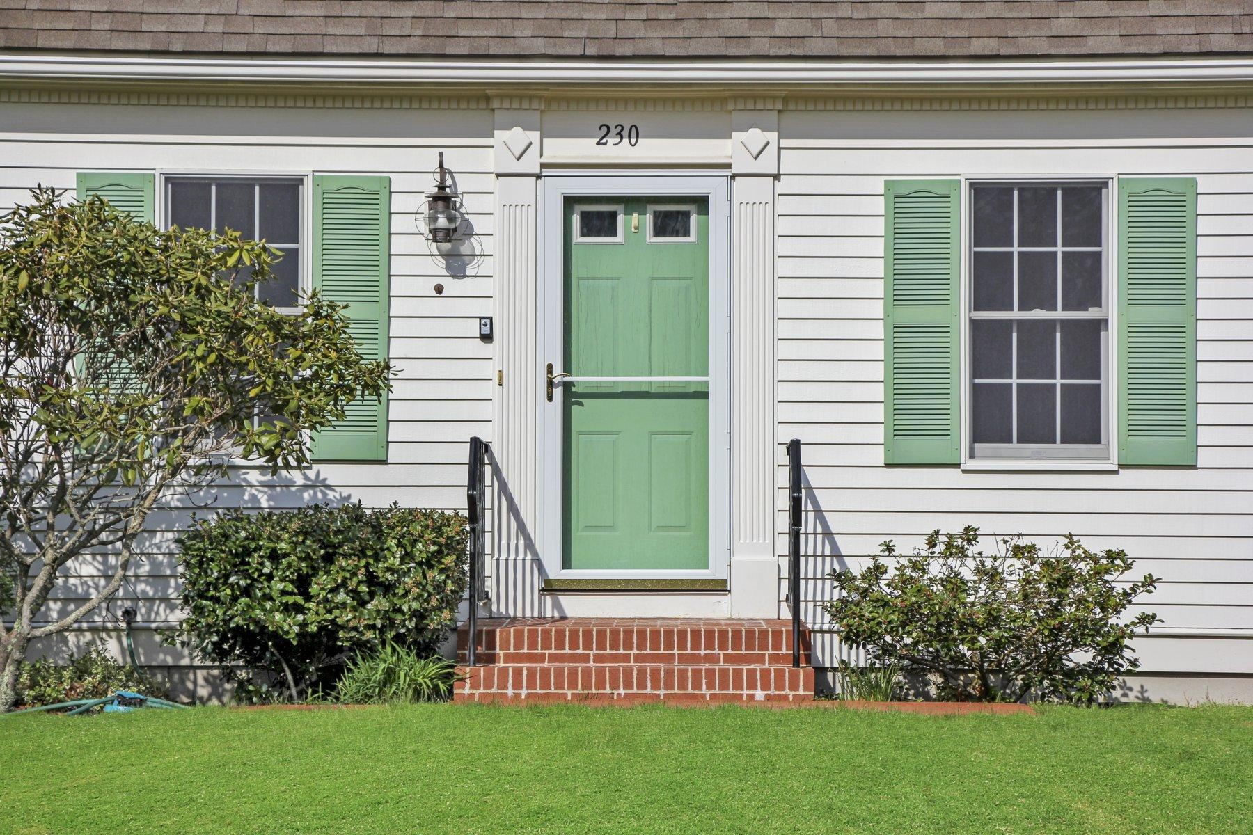 230 Chippingstone Road Chatham, MA 02633 - Photo 11 of 38 a front view of a house with a garden