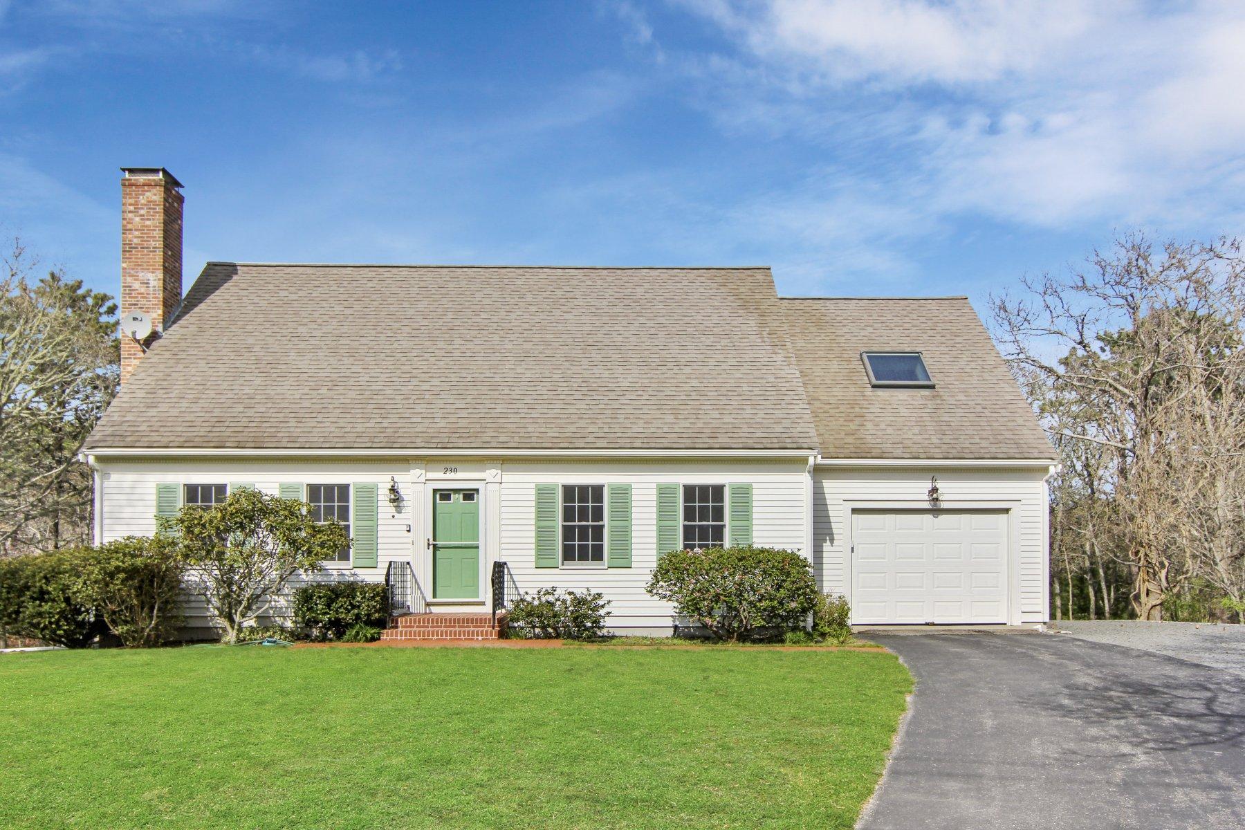 230 Chippingstone Road Chatham, MA 02633 - Photo 2 of 38 front view of a house with a yard