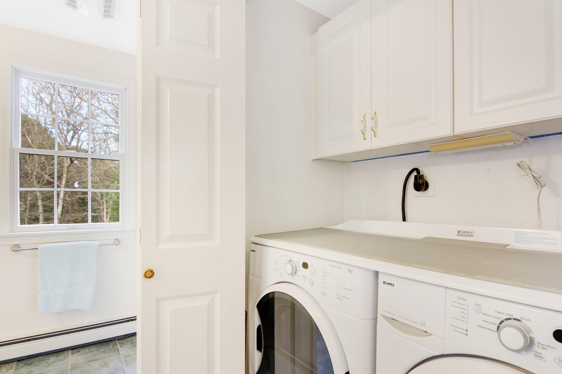 230 Chippingstone Road Chatham, MA 02633 - Photo 27 of 38 a bathroom with a sink and a window